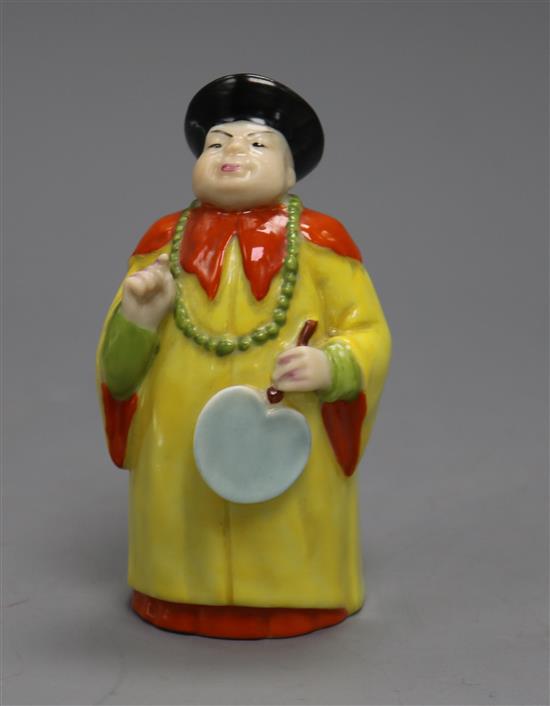 A Royal Worcester candle extinguisher of a Mandarin